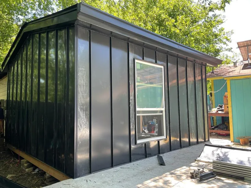 Black standing seam metal wall panels for Metal Roof Installation in Sappington