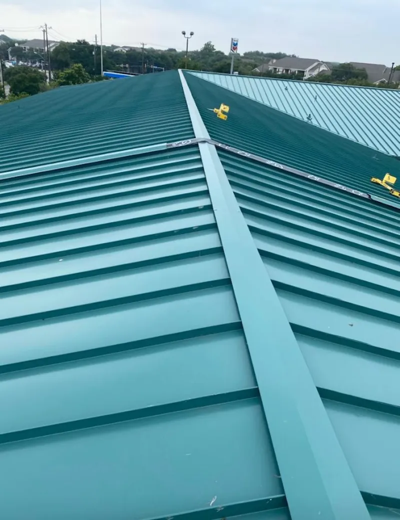 Green commercial metal roof ridge and valley for Metal Roof Repair in Sappington