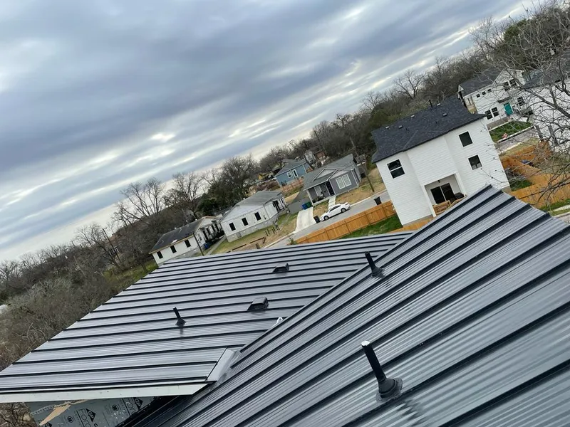 Standing seam metal roof panels with vents for Skylight Repair in Sappington